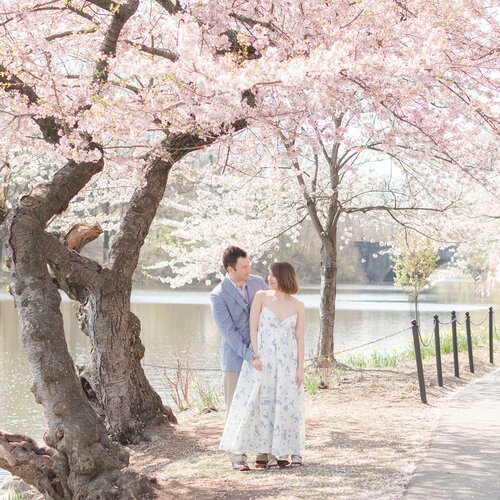 Julia and Nick in front of a lake